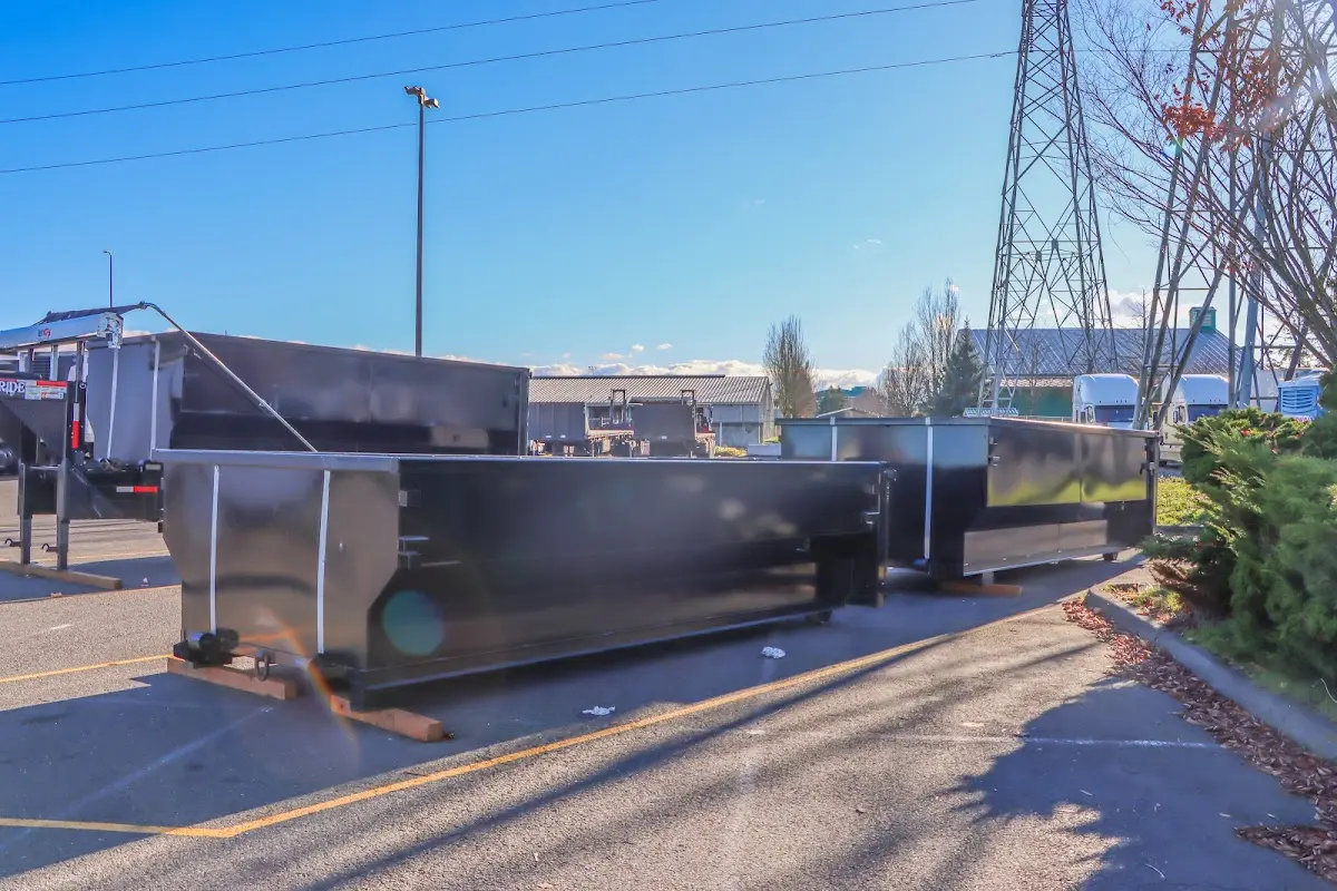 Roll-off dumpster ready for waste disposal at job site for Concrete Dumpster Rental in Commerce City